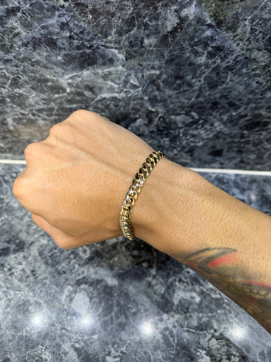 8mm Heavy 14K Gold Bonded Miami Cuban link bracelet worn on wrist