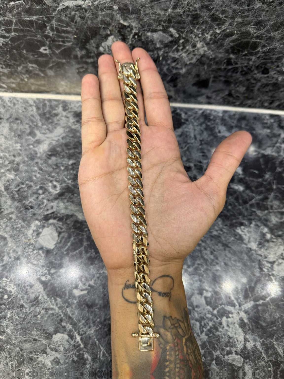 Exotvio 12mm Miami Cuban link bracelet handmade in .999 silver with Heavy 14K Gold Bonded finish.