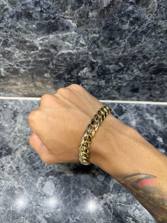 12mm Heavy 14K Gold Bonded Miami Cuban link bracelet worn on wrist